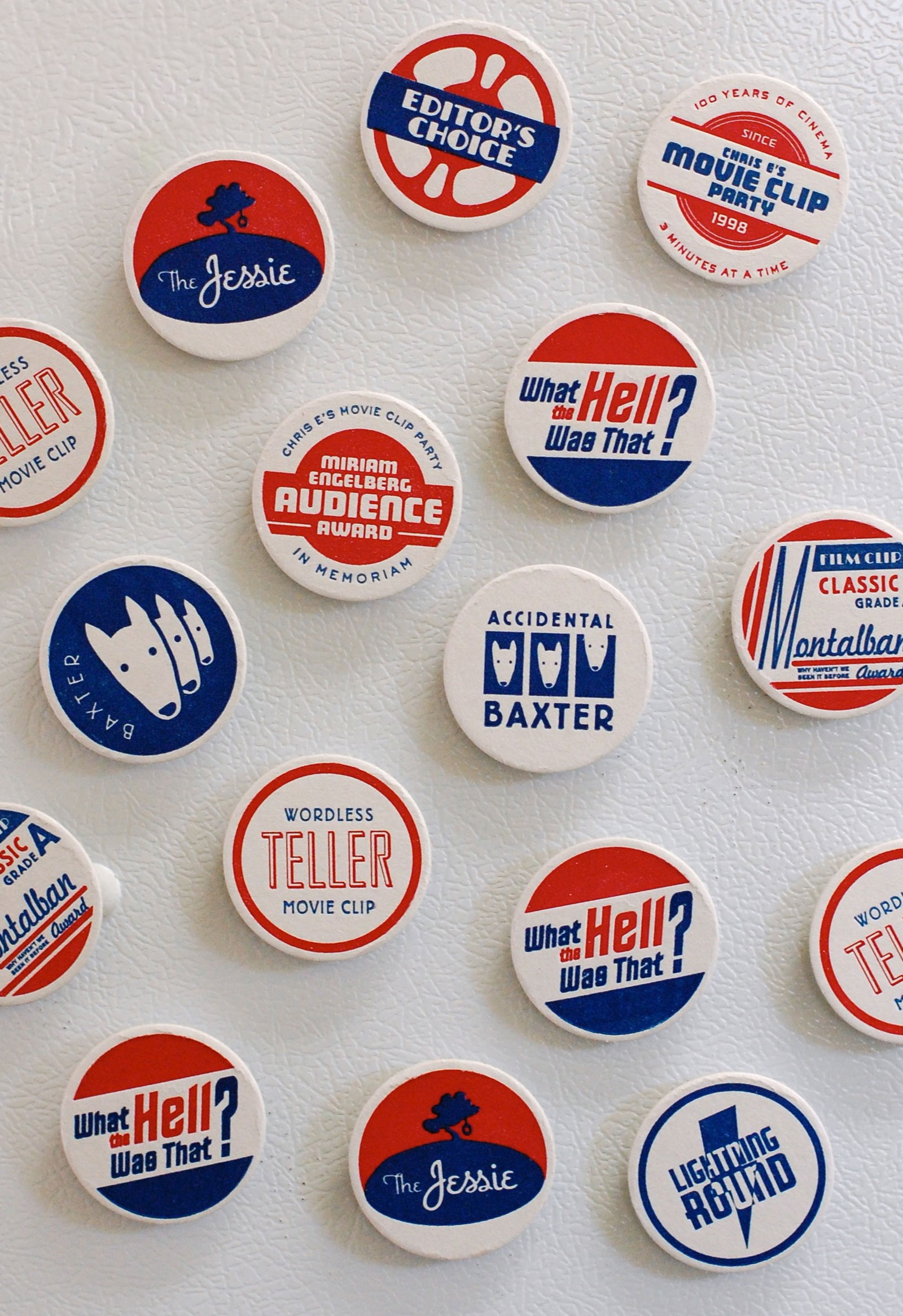Sixteen magnets on a refrigerator.
